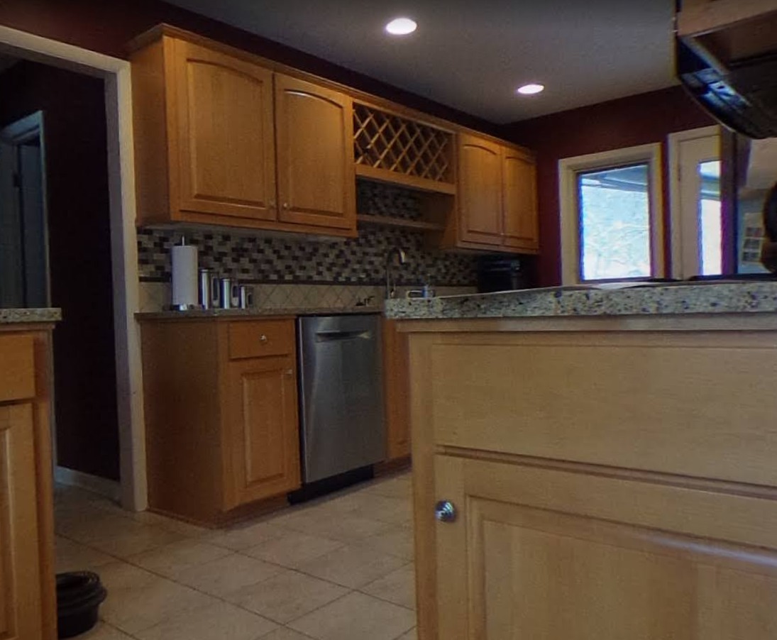 oak-kitchen-wine-rack-dishwasher-before-remodel