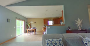 living-room-view-to-dining-and-kitchen-before-remodel