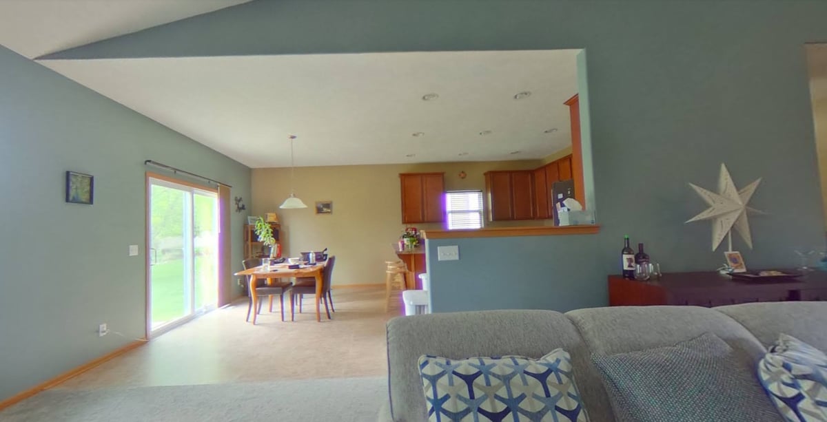 living-room-view-to-dining-and-kitchen-before-remodel