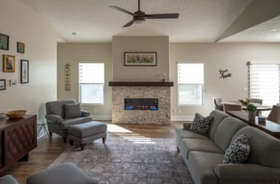 living-room-with-stone-fireplace-after-remodel
