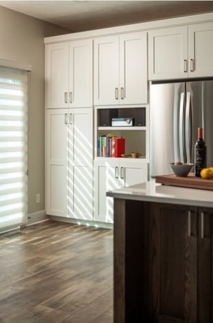 white-pantry-cabinets-and-fridge-after-remodel
