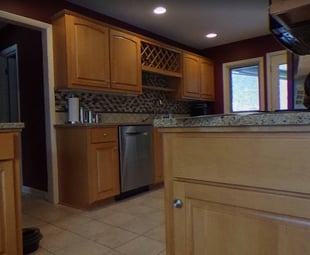 oak-kitchen-wine-rack-dishwasher-before-remodel