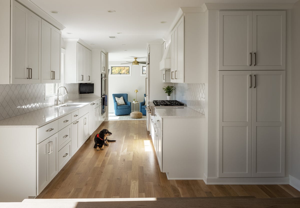 galley-kitchen-hallway-view-with-wood-flooring-omaha-ne-optimized