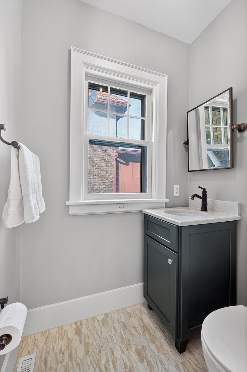 renovated-bathroom-with-pedestal-sink-omaha-ne-optimized