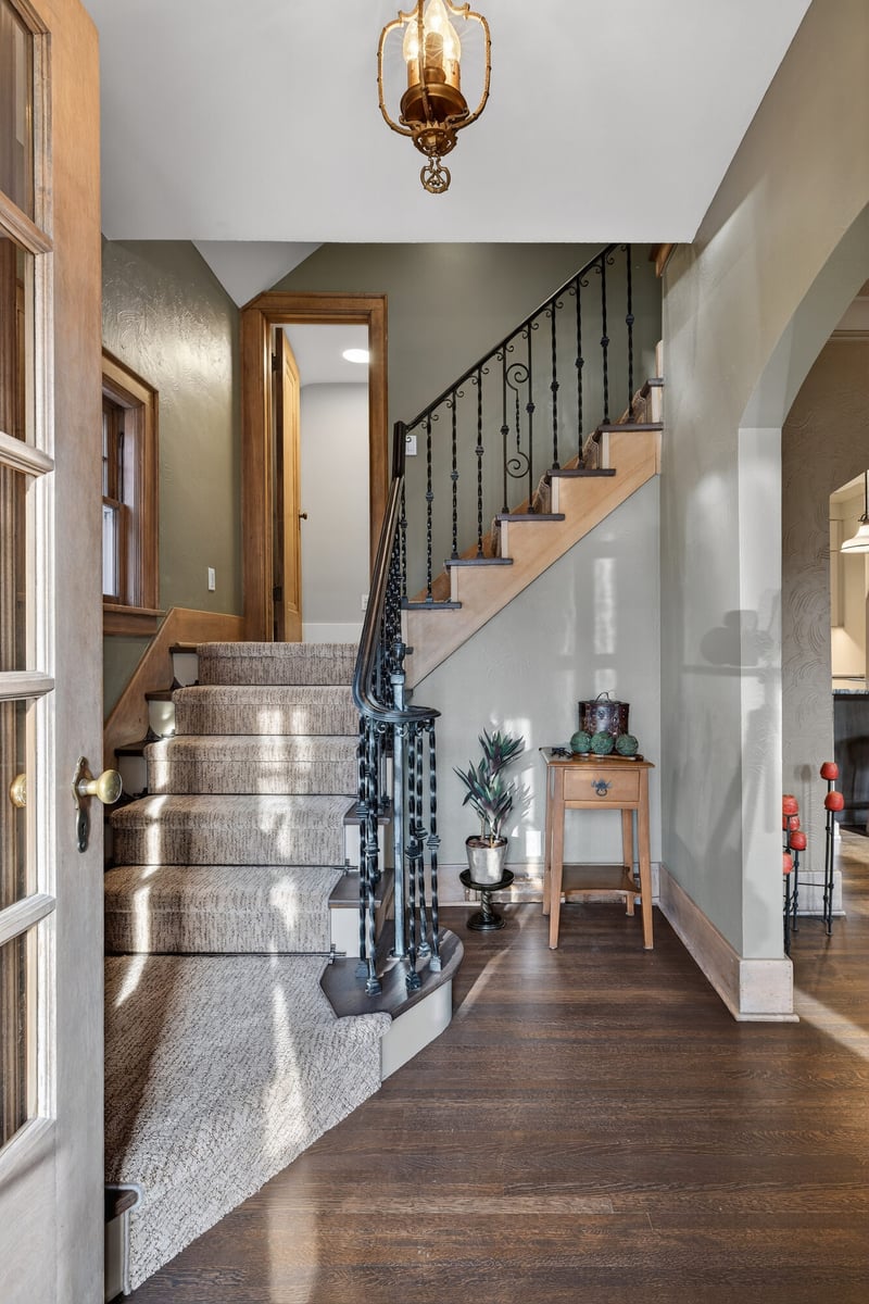 staircase-landing-with-wood-flooring-omaha-ne-optimized