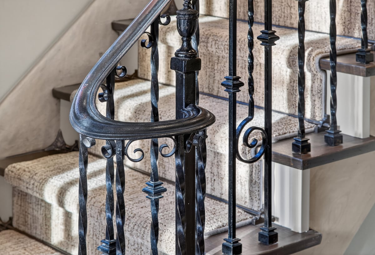 staircase-with-wrought-iron-railing-omaha-ne-optimized