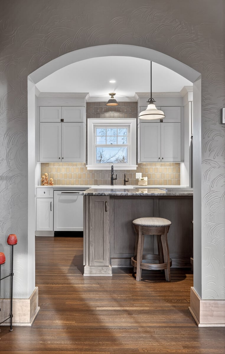 renovated-kitchen-view-through-arched-doorway-omaha-ne-optimized