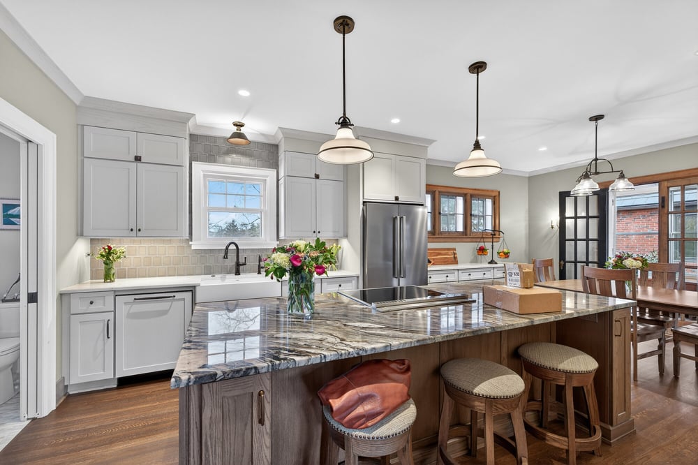 renovated-kitchen-with-island-and-pendant-lighting-omaha-ne