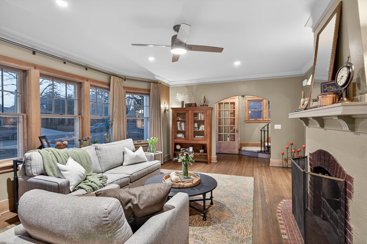 living-room-with-fireplace-and-bay-windows-omaha-ne-optimized