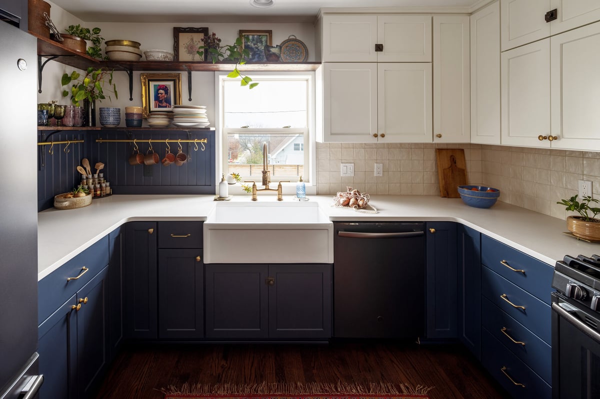 navy-and-white-two-tone-kitchen-with-farmhouse-sink-omaha-ne-optimized