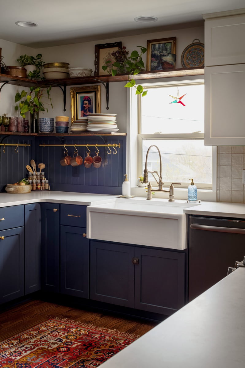 navy-kitchen-farmhouse-sink-with-open-shelving-omaha-ne-optimized