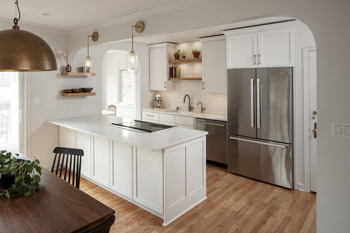 white-kitchen-island-with-stainless-refrigerator-omaha-ne-optimized