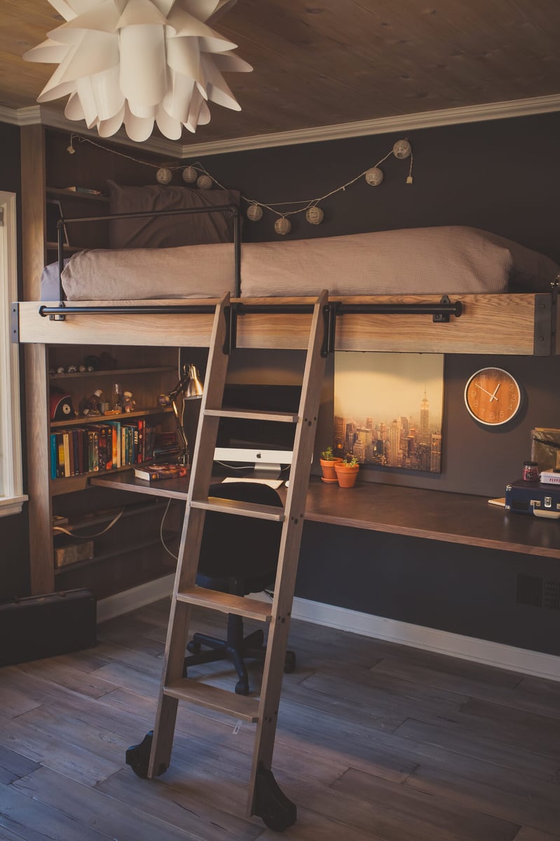loft-bed-over-built-in-desk-with-string-lights-omaha-ne-optimized