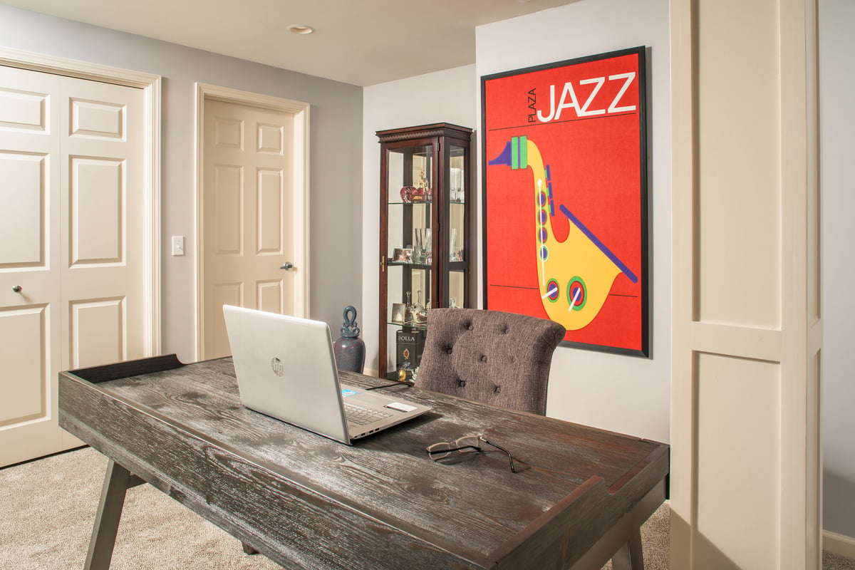 basement-office-desk-with-laptop-council-bluffs-ia-optimized