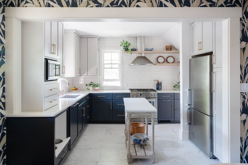 Bright kitchen remodel by HC Remodel & Design in Omaha, NE featuring blue and white shaker cabinetry, a custom island, open shel-optimized