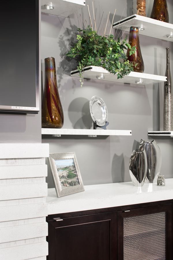 Custom concrete floating shelves with decorative accents in a first floor remodel by HC Remodel & Design in Omaha, NE.-optimized