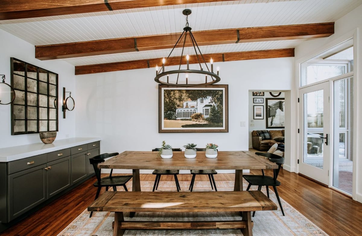 HC Remodel & Design first floor dining room remodel in Omaha, NE with exposed wood beams, modern lighting, and a custom dining s-optimized