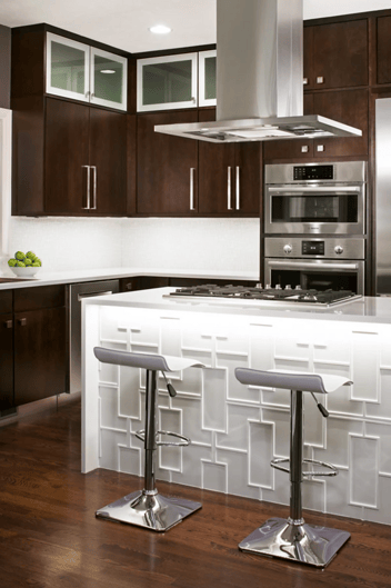 Image of a kitchen remodel with island seating