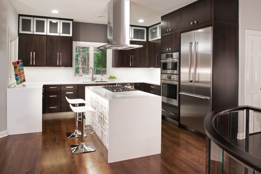 Custom kitchen remodel by HC Remodel & Design in Omaha, NE with dark wood cabinetry, stainless steel appliances, and a white wat-optimized