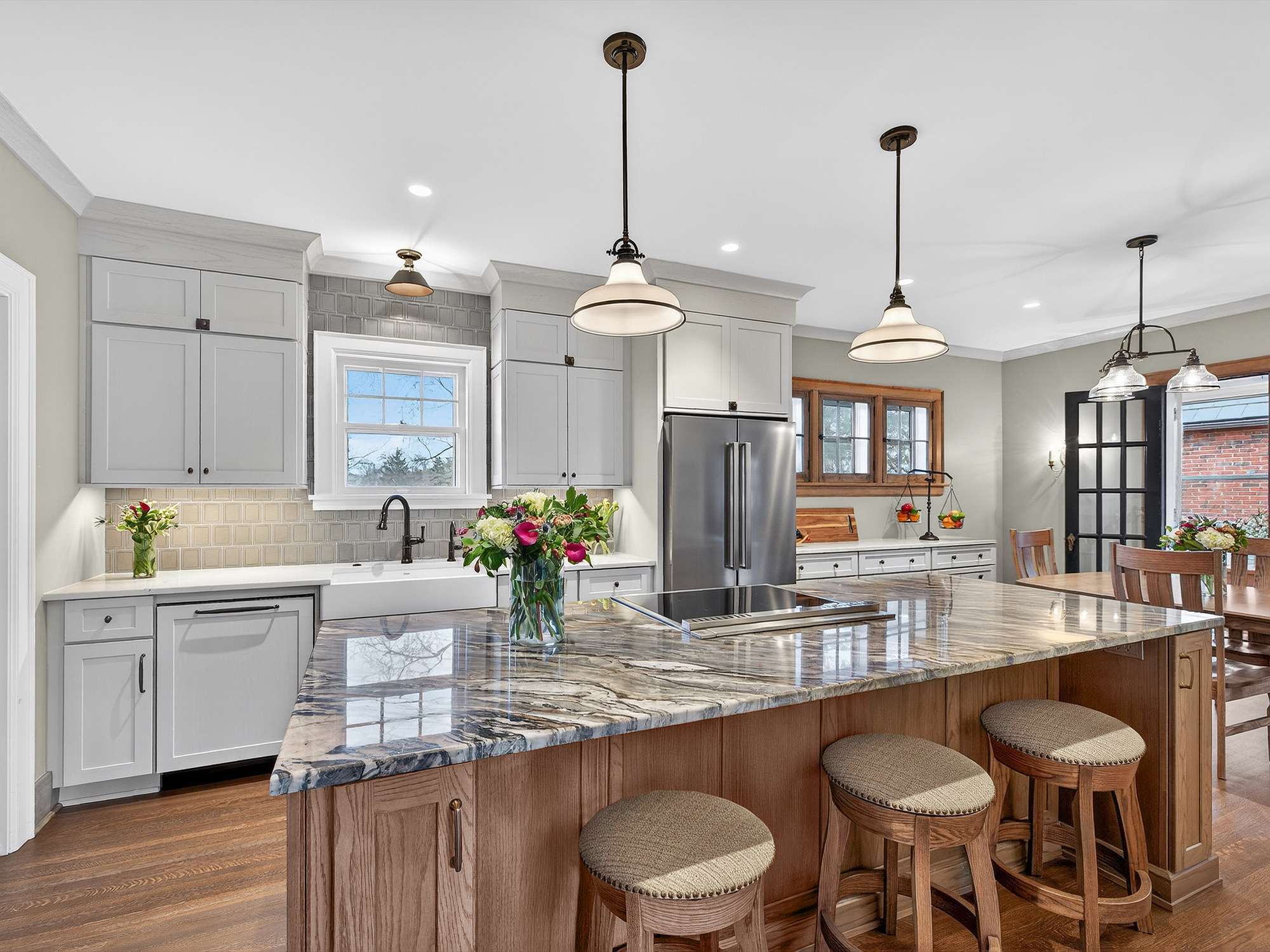 kitchen-remodel-gray-shaker-cabinets-marble-waterfall-island