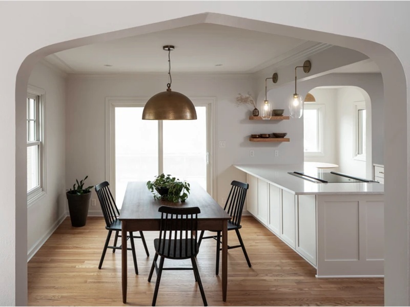 kitchen-dining-area-arched-doorway-brass-dome-pendant
