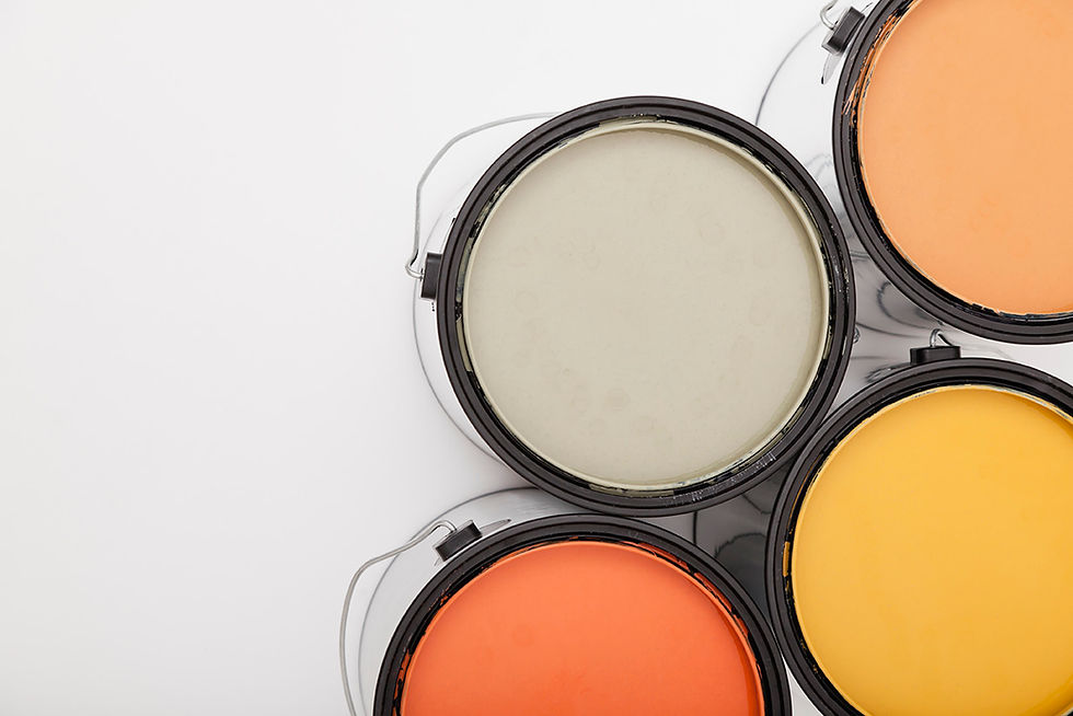 Image of different colors of buckets of paints