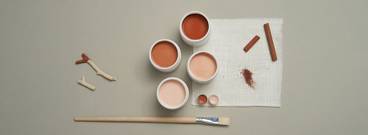 Image of paint and a paintbrush
